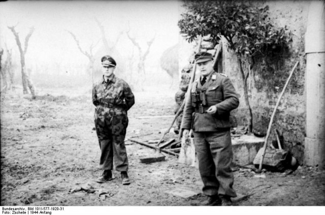 The commander of Paratrooper regiment 3,  Oberst Sebastian Ludwig Heilmann (left).  On his right Generalmajor Richard Heidrich commanding the 1st Paratrooper division.