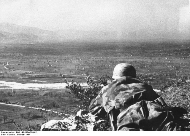A German paratrooper overlooking the valley of Cassino.