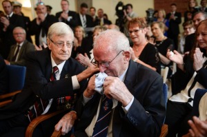 Emotional Aussie vet Donald McDonald was comforted by another Aussie vet Denis Kelly during the ceremony.