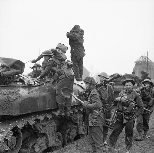 Infantry of 3rd Division climbing into Kangaroo personnel carriers prior to the attack on Kervenheim, 2 March 1945.