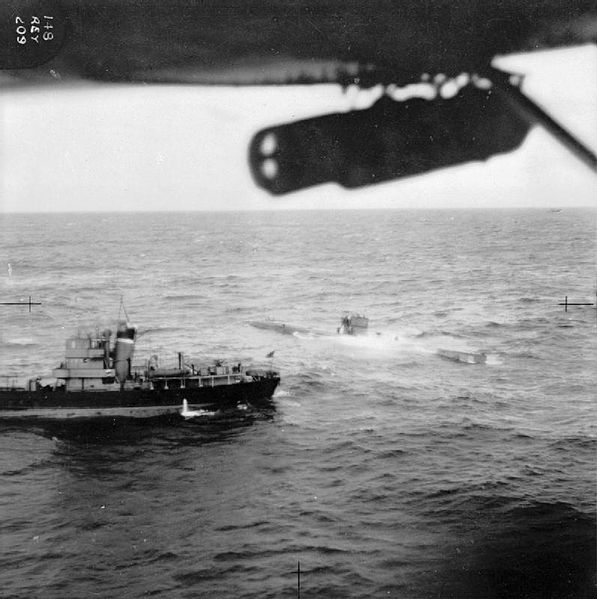 The RAF Catalina taking a picture of teh U570 surrendering to a British Royal Navy ship on 27 August 1941