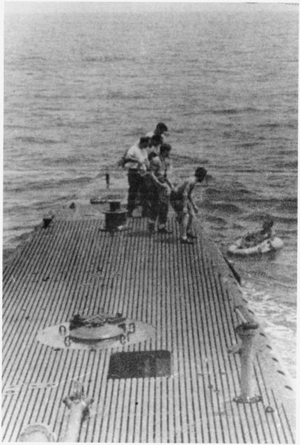 Being rescued by the submarine USS Finback.