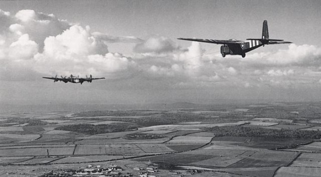 A Halifax towing a Hamilcar glider on the 6th June. Copyright: Museum of Army Flying.