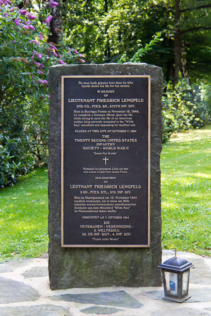 22 US Infantry Society, 4th Infantry Division, erects marker in Germany Military Cemetery honoring German LT Lengfeld who gave his life trying to save a US Soldier. Photo Credit.
