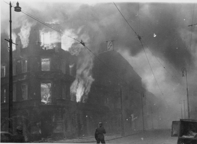 Stroop Report original caption: "Destruction of a housing block." Photo from intersection of Zamenhofa and Wołyńska.