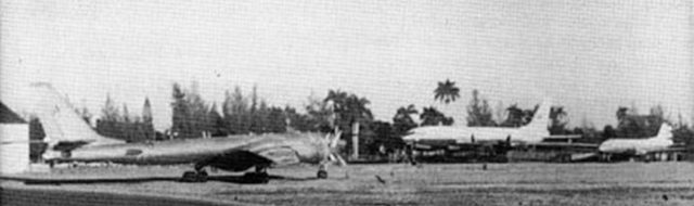 TU-95RTs (Bear D) parked in front of an Aeroflot Tu-114 (Cleat). Compare the enormous size of these two airplanes to that of the Ilyushin Il-14 parked to the right. San Antonio de los Baños airbase, 1973.