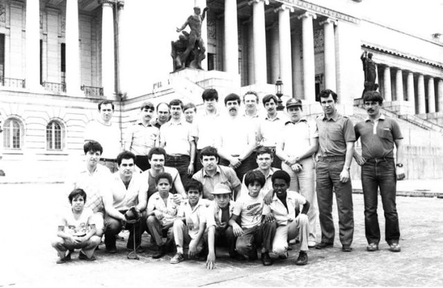 TU-142M (Bear F) crewmen of the 35th PLAP from Fedotovo posing before the Havana Capitol with local children.