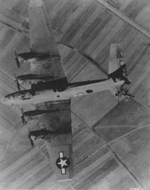 Damaged missiles from German fighter American bomber B-17 (Boeing B-17 Flying fortness) in the sky near the Italian airfield Villaorba (Villaorba) [Via].