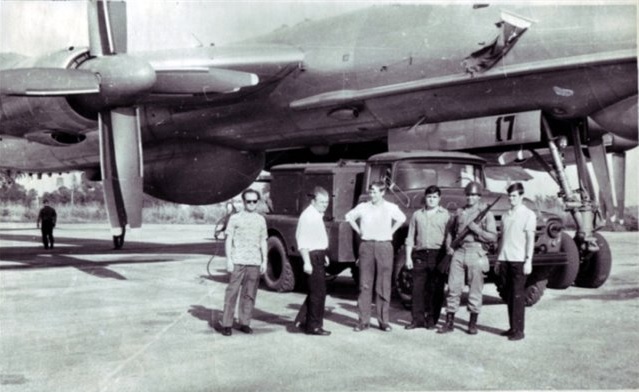 Crewmen of the 392nd ODRAP: A. Baranov, unknown, A. Ivanov, Capt. A. F. Bychkov, Cuban sentry, unknown. Standing before Red 17. San Antonio Airfield, Havana, Cuba, 1974. 