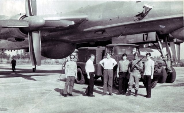 Crewmen of the 392nd ODRAP: A. Baranov, unknown, A. Ivanov, Capt. A. F. Bychkov, Cuban sentry, unknown. Standing before Red 17. San Antonio Airfield, Havana, Cuba, 1974.