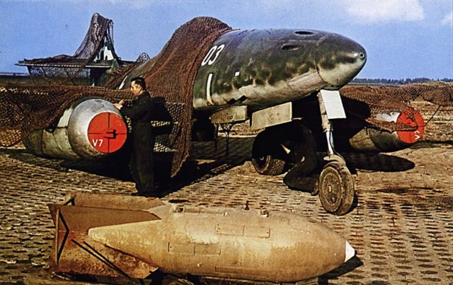 Technicians inspect a German jet fighter Messerschmitt Me-262V7, serial number 130303 at the airport in Germany. The photo was taken after the surrender of Germany.
