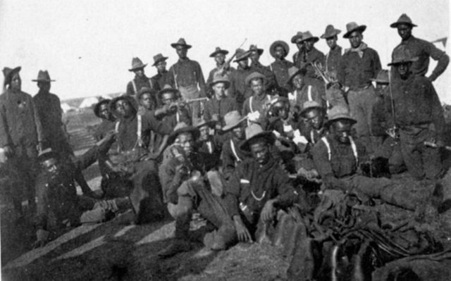 Segregated company of US Soldiers (likely Buffalo Soldiers), Camp Wikoff, 1898 --during the Spanish-American War. Wikipedia / National Archives and Records Administration / Public Domain
