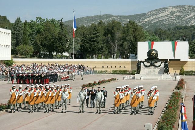 Each year, the French Foreign Legion commemorates and celebrates Camarón in its headquarters in Aubagne and Bastille Day military parade in Paris; featuring the Pionniers leading and opening the way. Wikimedia Commons / Public Domain