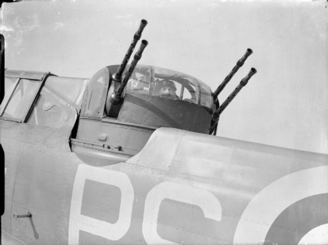 The powered ball turret of the Defiant. It contained four 303 Caliber Browning machine guns. It allowed the planes to fire in almost every direction except for forward and down. Turret operators would coordinate their fire with the Pilot, who would put the plane into the optimal firing position. Source: wiki/ public domain.