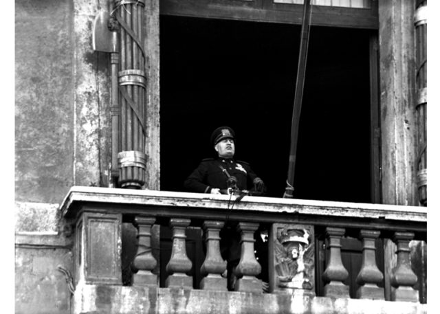 Mussolini delivering his declaration of war speech, from the balcony of the Palazzo Venezia in Rome. Wkipedia / Public Domain