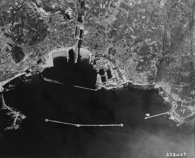 An aerial photograph of the Cherbourg harbor in 1944. These photos helped Walsh to plan the assault. Image Source: Wikimedia Commons/public domain.