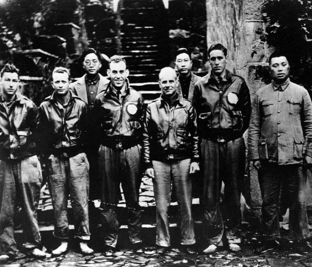 Lt. Col. Doolittle with members of his flight crew and Chinese officials in China after the attack. From left to right: Staff Sgt. Fred A. Braemer, bombardier; Staff Sgt. Paul J. Leonard, flight engineer/gunner; General Ho, director of the Branch Government of Western Chekiang Province; 1st Lt. Richard E. Cole, copilot; Doolittle; Henry H. Shen, bank manager; Lt. Henry A. Potter, navigator; Chao Foo Ki, secretary of the Western Chekiang Province Branch Government.