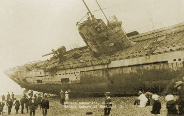 U-118, the U-Boat which sank the Wellington was later beached in 1918. Here it is shown on beach in southern England. Image Source: Wikimedia Commons/ Public Domain.
