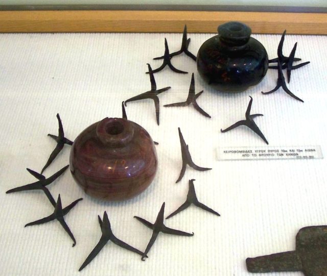 Hand grenades filled with Greek fire; surrounded by caltrops from 10th-12th century. Photo Credit.