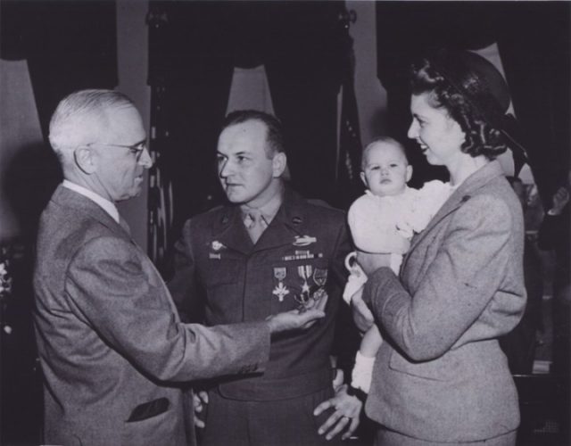 President Harry S. Truman awarding Chilson with his wife and daughter in attendance