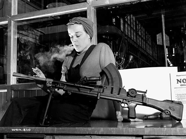 "Ronnie, the Bren Gun Girl," a Canadian WWII icon, posing with a Bren Gun at the Inglis Plant in Toronto (1941)