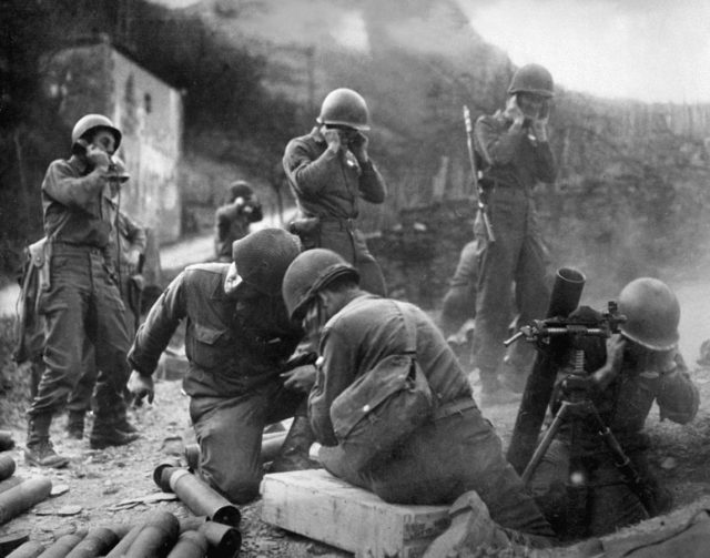 American mortar crew in action near the Rhine, 1945.
