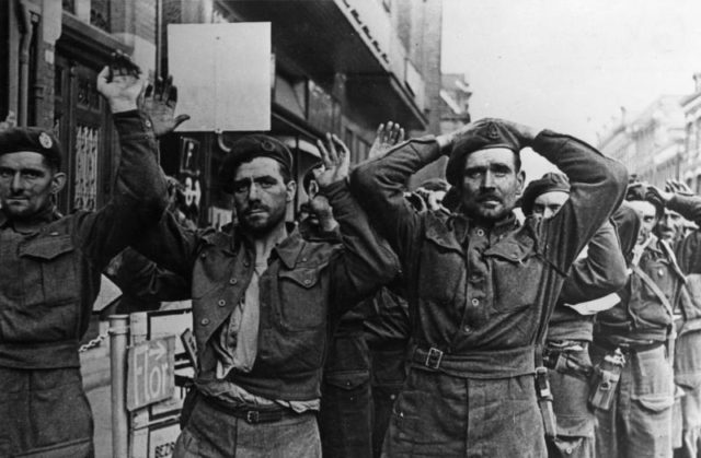 British prisoners after Arnhem fell. The men hadn't shaved in 4 days due to lack of water, morale was destroyed, and their ammunition was depleted. This defeat has gone down as one of the darkest days in British Airborne history. Image Source: Wikimedia Commons/ By Bundesarchiv, Bild 183-S73820 / CC-BY-SA 3.0, CC BY-SA 3.0 de, https://commons.wikimedia.org/w/index.php?curid=5369460