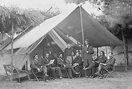 Ely, seated second from right with other officers of Grant's (middle) staff
