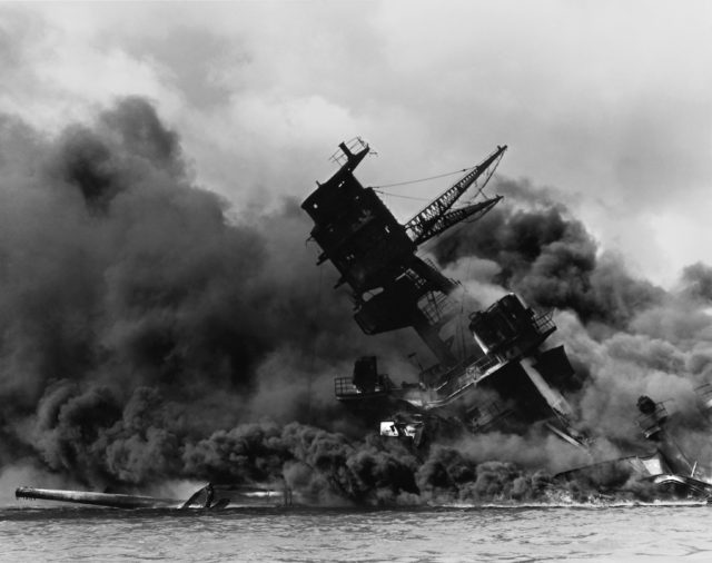 The USS Arizona struck by Japanese bombers in Pearl Harbor