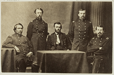 Ely S. Parker seated at left, Ulysses S. Grant seated at center