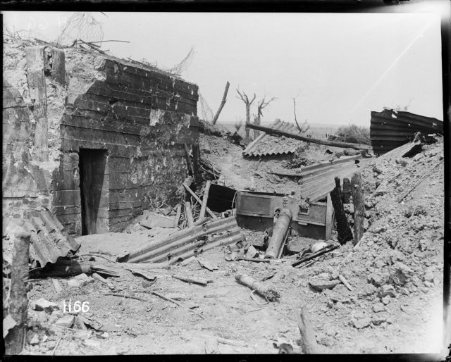 German 77mm gun emplacement destroyed by New Zealand troops during the Battle of Messines, Belgium. Photograph taken by Henry Armytage Sanders in June, 1917.