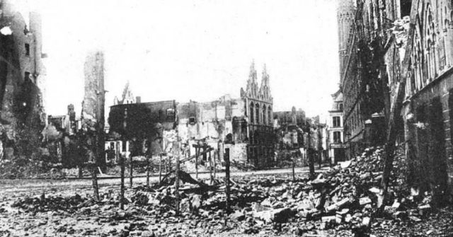 Ypres was the scene of much of the bloodiest fighting of the war. Three great battles were fought for its possession. The photograph shows what was once the market place.