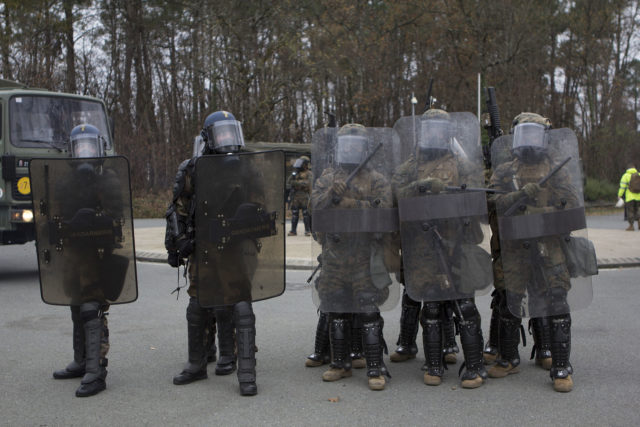 US Marines and French Gendarmerie in modern Body Armor. 