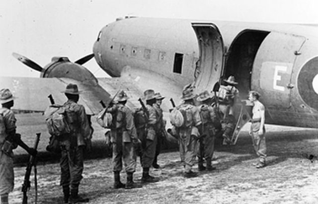 The Nigeria Regiment, 3rd West African Brigade (Thunder) preparing to board an RAF Dakota for Operation Thursday Photo Credit