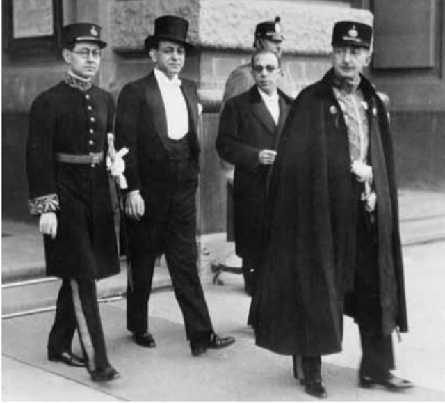 Sardari (second from the right in glasses) with the Iranian senior staff as they fled Paris in 1940.