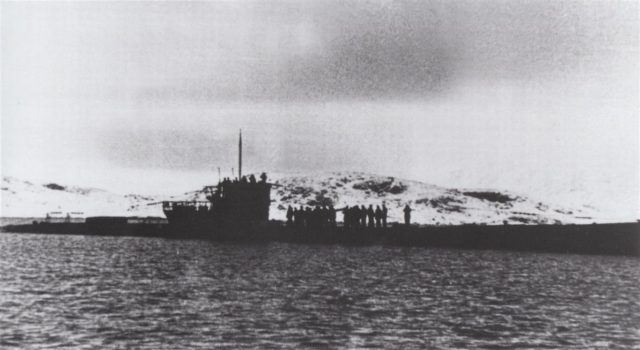 U-537 rides at anchor in Martin Bay (also known as Attinaukjuke Bay) at 60º04’05”N, 64º23’06”W on the Labrador coast of Newfoundland twenty miles south of Cape Chidley on October 23, 1943. Note the absence of the U-boat’s Flakvierling 38 flexible quadruple 20mm anti-aircraft gun mount.