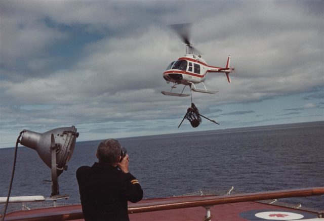 The automated weather station Wetter-Funkgerät Land-26 (WFL-26) is seen here as it is brought aboard the Canadian Coast Guard Heavy Arctic Icebreaker Louis S. St-Laurent in July 1981.