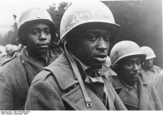 African-American POWs captured at the Battle of the Bulge in December 1944. By Bundesarchiv – CC BY-SA 3.0 de
