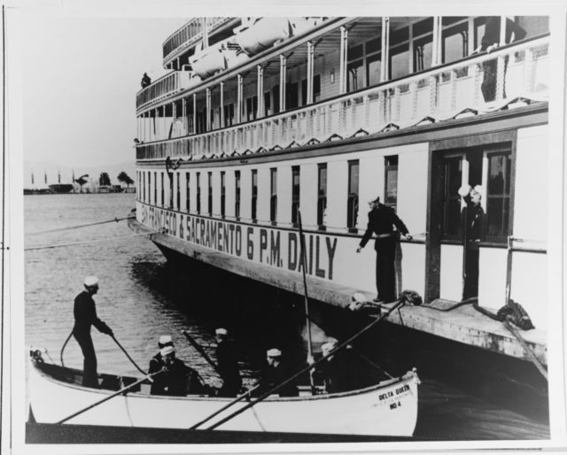 Naval reservists from the San Francisco Bay area report on board, after being called to active duty in 1940. DELTA QUEEN served as a Navy barracks and training ship at Yerba Buena and Treasure Islands, in San Francisco Bay, between 1940 and 1946.