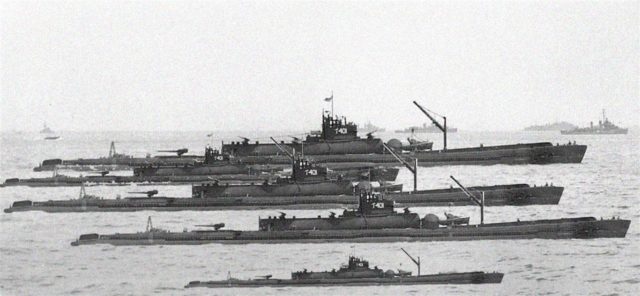 Photo above gives some scale: the “Standard” size WW II Submarine in the front and the 3 Japanese Monster Subs of the I-400 series in the backdrop.