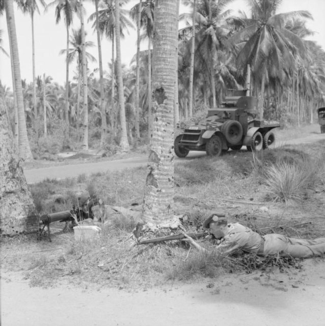 Men of the 2nd Argyll and Sutherland Highlanders training with a Lanchester six-wheeled armored car in the Malayan jungle on 13 November 1941;