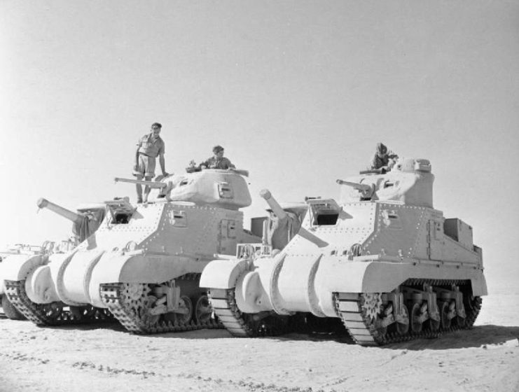 British M3 Grant (left) and Lee (right) at El Alamein (Egypt), in the Sahara Desert, 1942, showing differences between the British turret and the original design.
