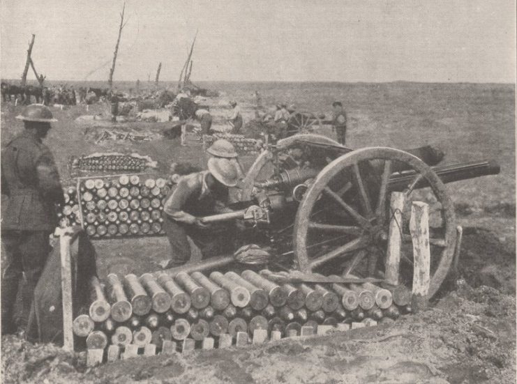 The 14th Battery of Australian Field Artillery, 5th Field Artillery Brigade, 2nd Division, loading a British 18-PDR field gun near Bellewaarde Lake, in the Ypres Sector.