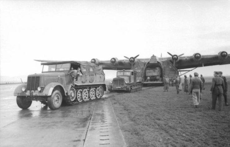 German reinforcements; a Sd.Kfz. 8 half-track and a tractor pull transport from a Messerschmitt Me 323 Gigant. Photo: Bundesarchiv, Bild 101I-552-0822-36 / Pirath, Helmuth / CC-BY-SA 3.0.