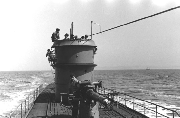 U-166 at sea en route to occupied France (1942). Note the U-Boat’s 10.5cm Schiffs Kanone C/32 deck gun