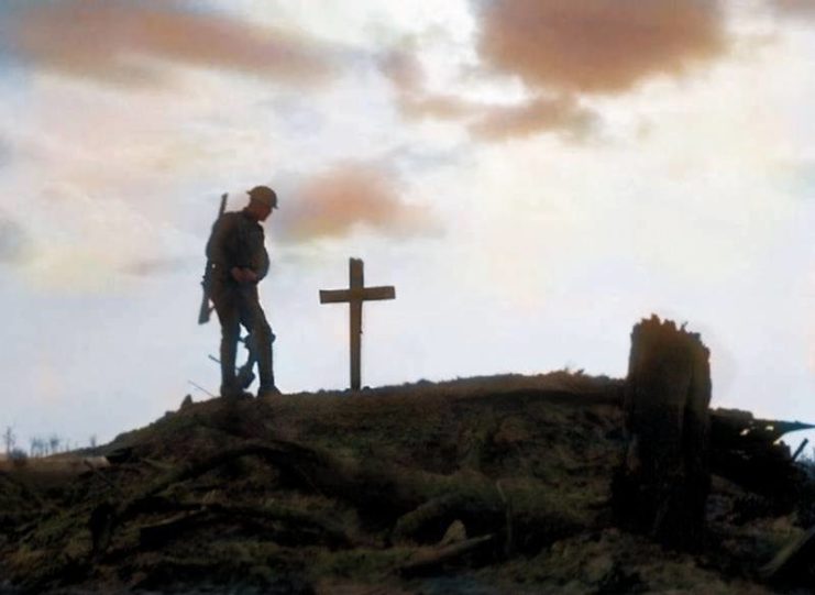 A British soldier stands besides the grave of a comrade near Pilckem during the Third Battle of