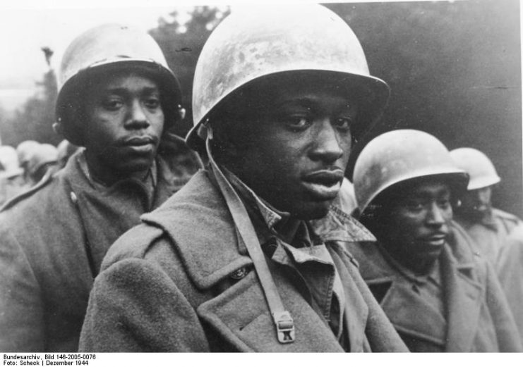 American POWs captured at the Battle of the Bulge in December 1944; By Bundesarchiv – CC BY-SA 3.0 de