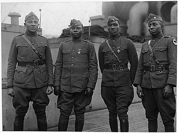 Officers of the American 366th Infantry Regiment returning home from the hell on earth that was World War I service. Nearly a hundred years on from their experiences, the US Army is now proud to call itself “the most colorblind organization in the world.”