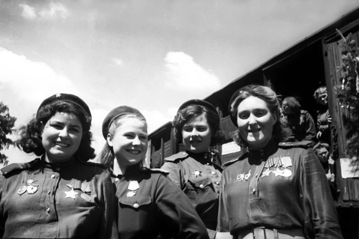 Well-decorated Red Army women snipers celebrate victory in 1945. During the war, six women snipers were awarded the gold star of Hero of the Soviet Union. RIA Novosti photo