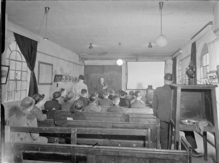 A classroom lecture where Bevin Boys are learning about Davy lamp at Ollerton, Nottinghamshire, in February 1945.